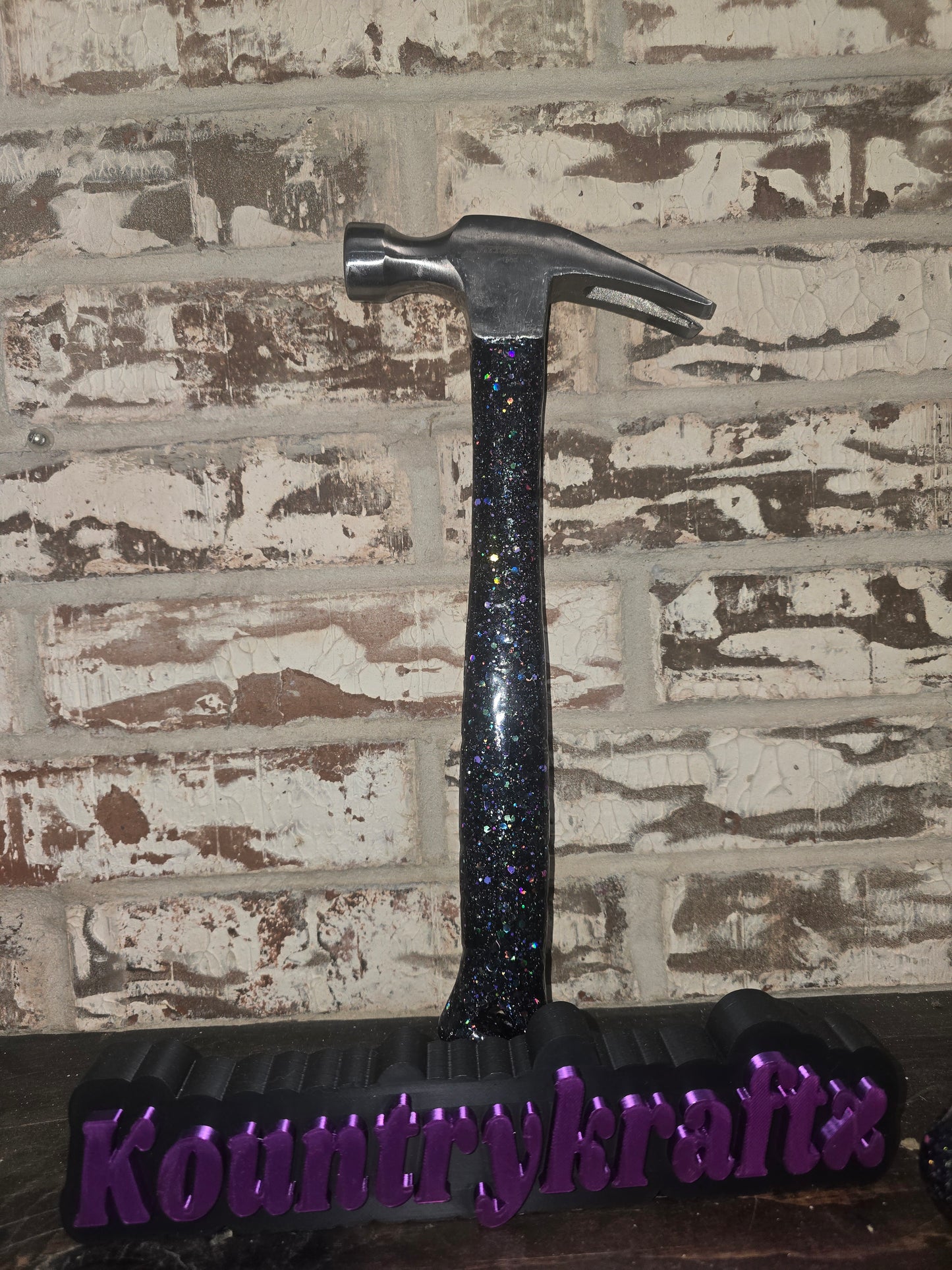 Black with pops of purple glittered hammer and screwdriver set