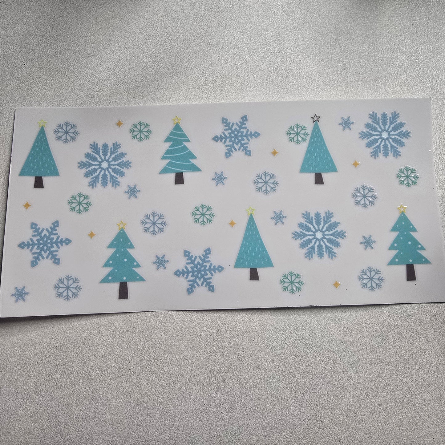 Blue snowflakes and trees