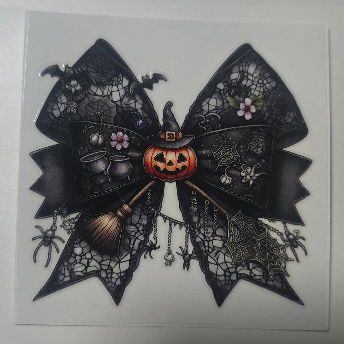 Black pumpkin broom bow