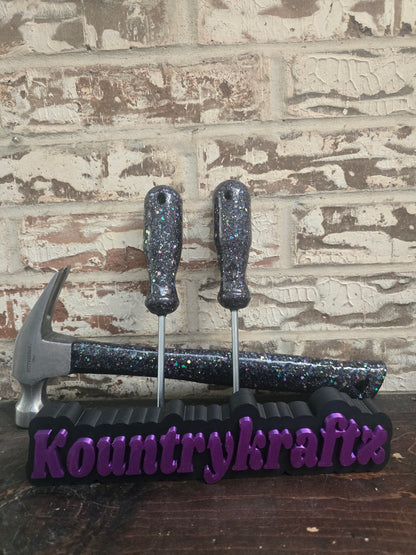 Black with pops of purple glittered hammer and screwdriver set