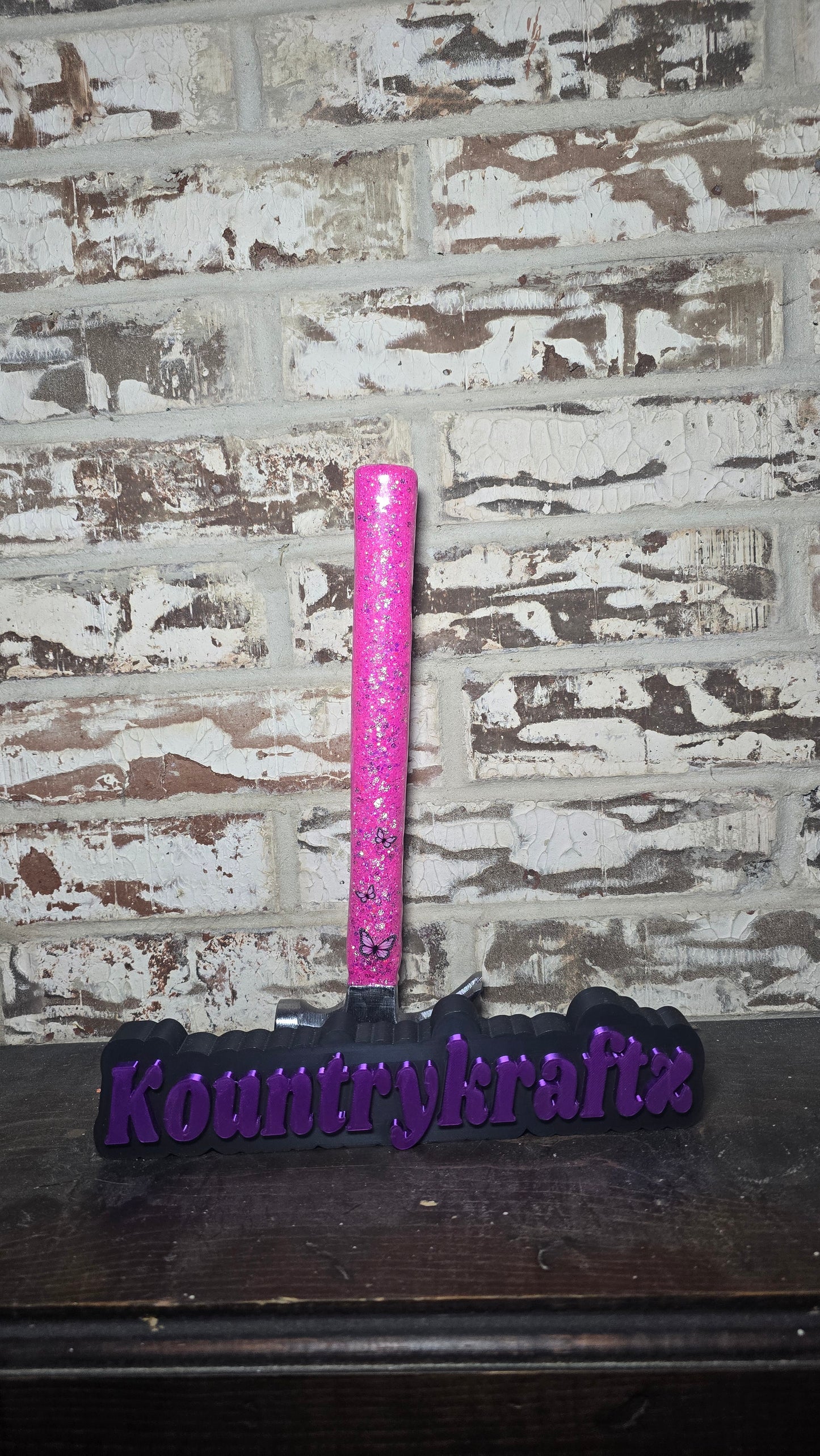 Pink glitter hammer with butterflies